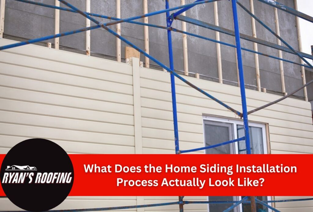 Home siding installation with scaffolding in progress