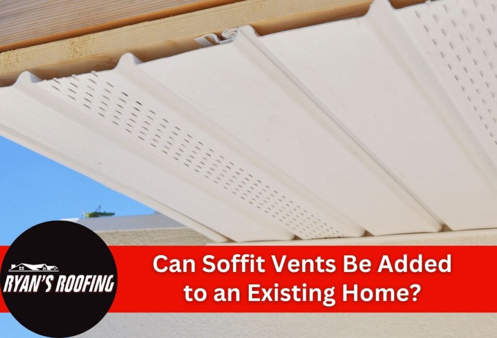 Close-up view of white soffit vents installed under a roof eave.